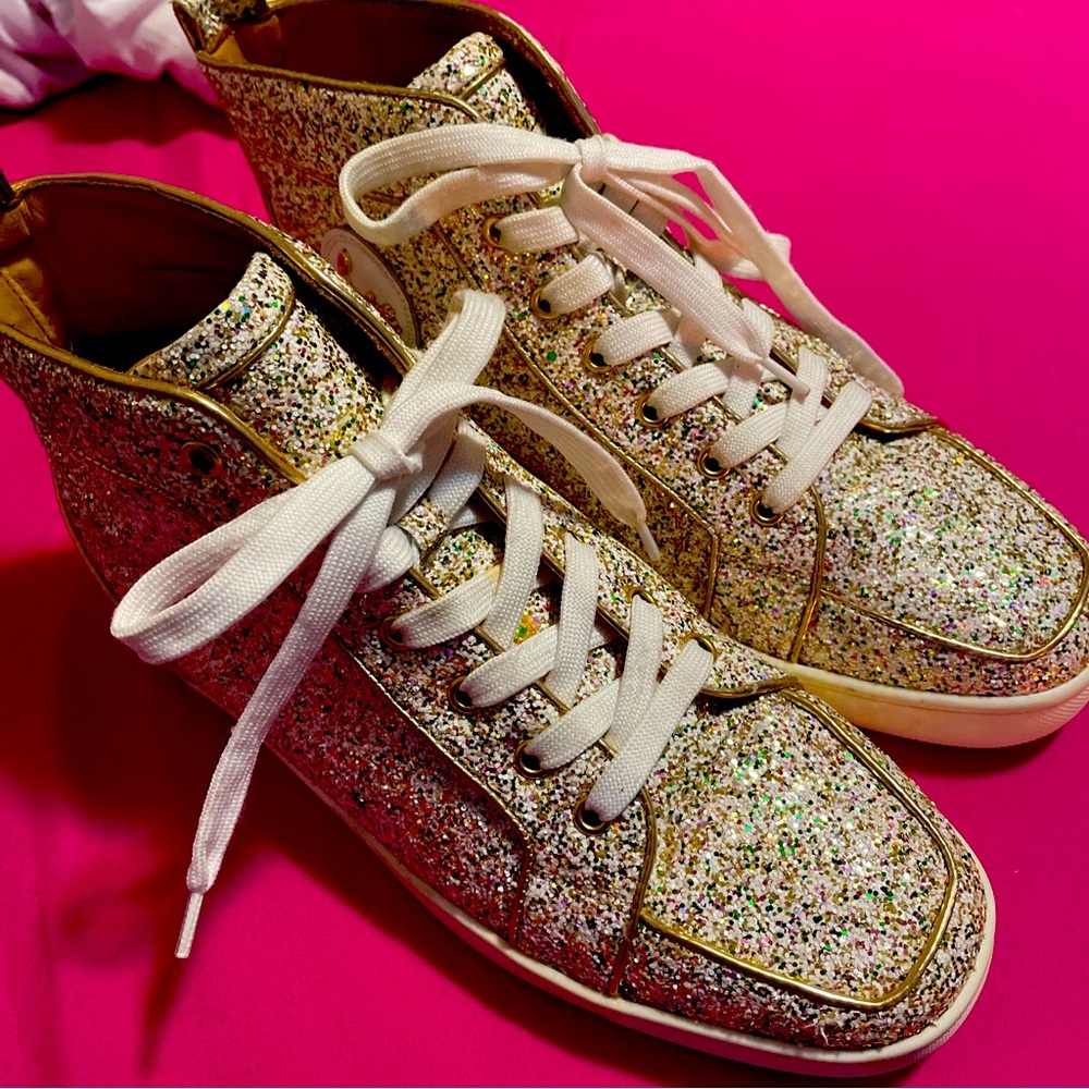 Louboutin Sneakers with glitter.